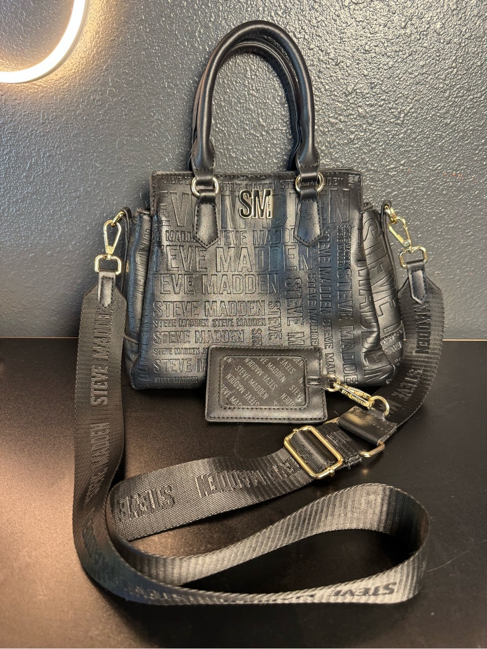 Steve Madden Black Embossed Logo Satchel with Gold Hardware and Detachable Strap
